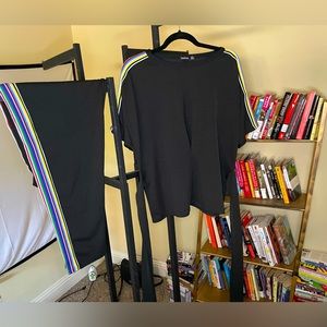 This outfit consists of two separate matching parts, a shirt and pants to match.